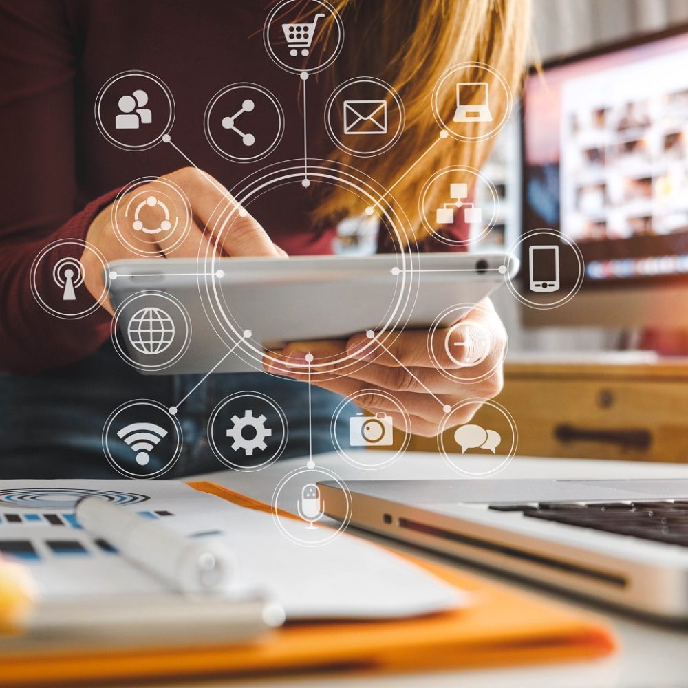 Businesswoman,Hand,Working,With,Laptop,Computer,,Tablet,And,Smart,Phone